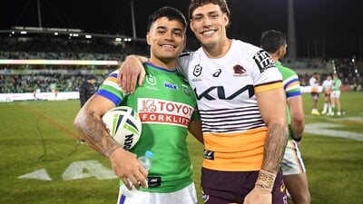 Matt Timoko and Jordan Riki after the Broncos' last game in Canberra in 2023.