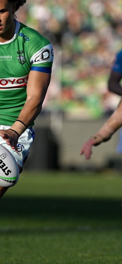 Canberra Raiders player Kaeo Weekes kicks the ball.