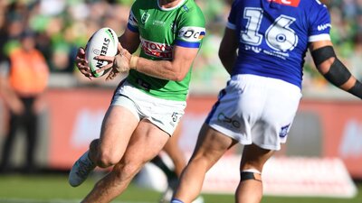 Canberra Raiders player Zac Hosking running the ball.