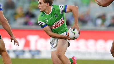 Canberra Raiders player Owen Pattie passing the ball.