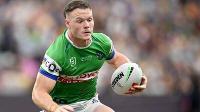 Canberra Raiders player Ethan Strange running the ball.