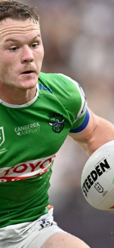Canberra Raiders player Ethan Strange running the ball.