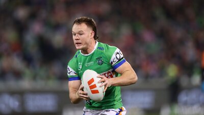 Canberra Raiders player Ethan Strange running the ball.