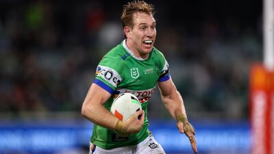 Canberra Raiders player Zac Hosking running the ball.