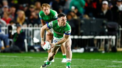 Canberra Raiders player Tom Starling passing the ball.
