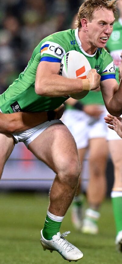 Canberra Raiders player Zac Hosking running the ball.
