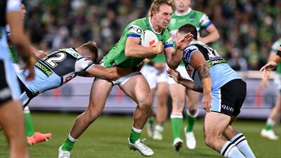 Canberra Raiders player Zac Hosking running the ball.