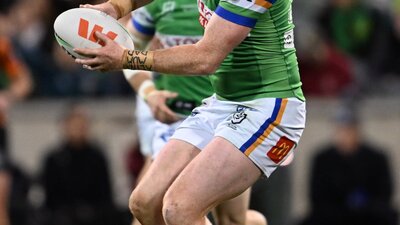 Canberra Raiders player Corey Horsburgh passing the ball.