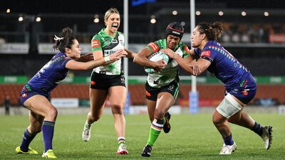 Canberra Raiders NRLW player Sereana Naitokatoka running the ball.