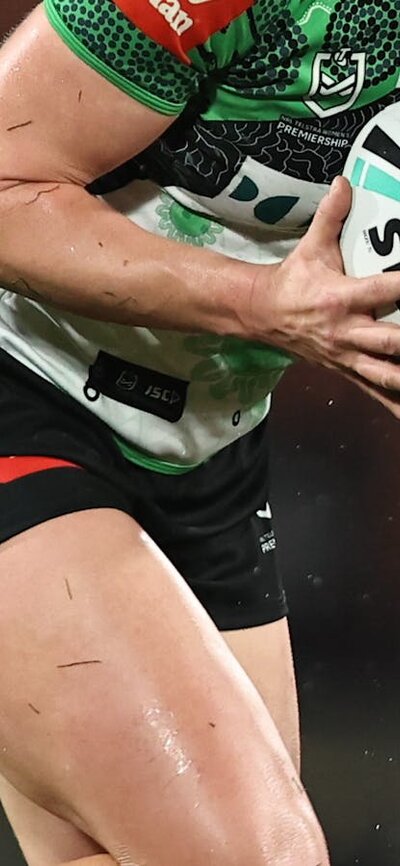 Canberra Raiders NRLW player Sophie Holyman running the ball.