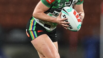 Canberra Raiders NRLW player Sophie Holyman running the ball.