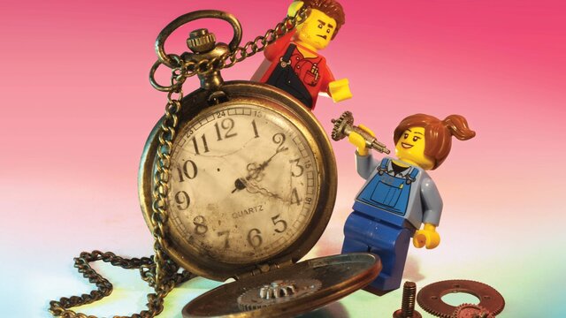 RELICS hero image featuring two miniature lego figures interacting with vintage stopwatch