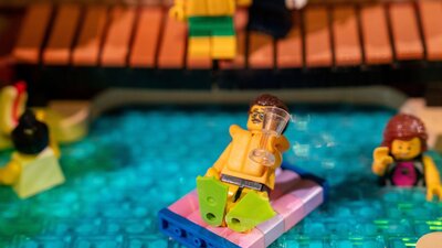 LEGO® minifigure in pool in RELICS exhibit