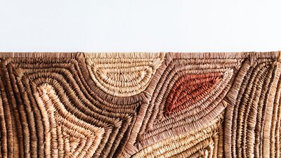 Close up of woven artwork