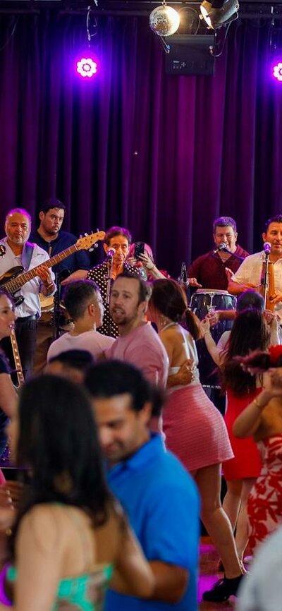 Local latin band Mi Tierra plays at Salsa on Saturday dancers in the foreground