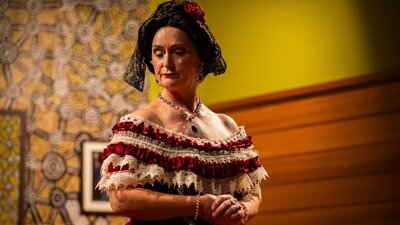 Opera singing wearing a red dress