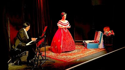 Opera singer performing with piano accompaniment