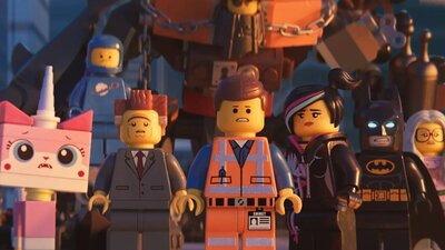 Lego characters standing in a group looking towards camera