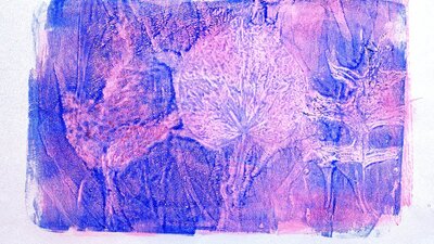 Purple and pink leaf patterns screened onto paper