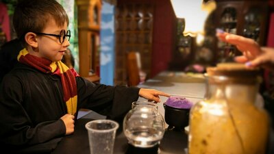 Young wizard potion making