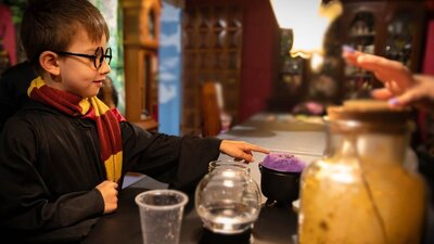 Young wizard potion making