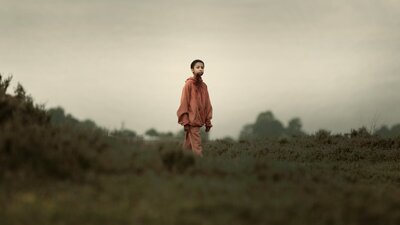 Science. Art. Film.: The Girl with All the Gifts 26 October, 2026 Young child with shaved head stands in isolated surrounds with blood around mouth