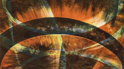 An abstract monoprint using hues of yellow, blue, orange and red.