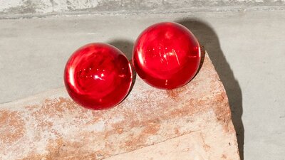 two graves, one gun, 2024, part of Canberra Glassworks exhibition Glass Artwork, Canberra red brick, hot sculpted and cold worked glass, glue