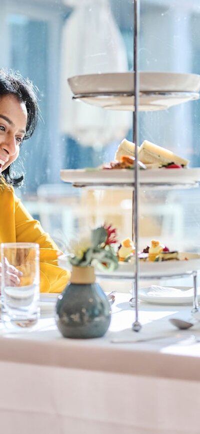 Mother and young daughter enjoying high tea at Parliament House