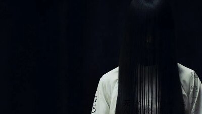 Faceless figure with long black hair and black background