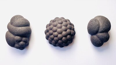 Three small sculptures made from round shapes
