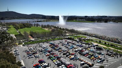 Drone footage of the Classic Cruise Show N Shine - cars parked in a car park in Canberra near a lake