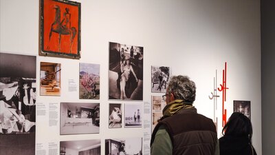 People exploring the Taglietti Exhibition