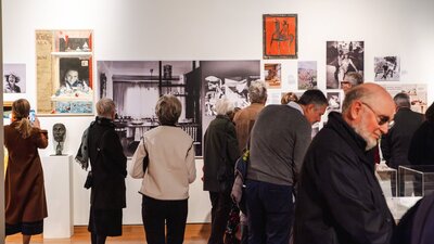 People exploring the Taglietti Exhibition