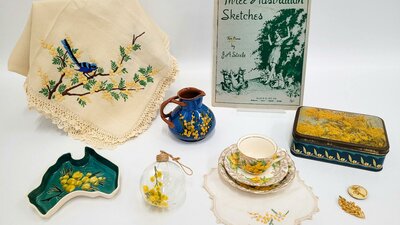A collection of wattle themed objects collected by Dawn Waterhouse