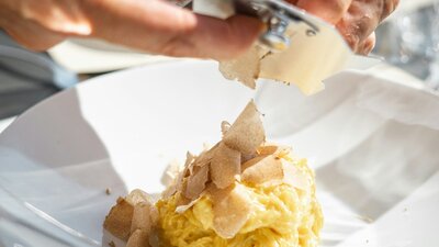 Truffle grated over pasta