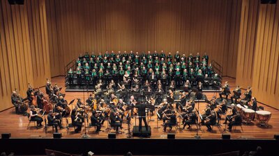 CCS & NCO Beethoven Missa Solemnis concert Orchestra, soloists and choir performing on Llewelyn Hall stage with Louis Sharpe conducting