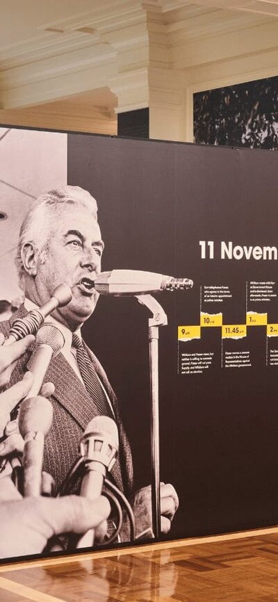 A wide shot of the Dismissal exhibition in King's Hall at Old Parliament House.