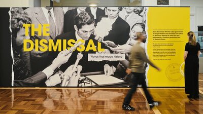 A wide shot of the Dismissal exhibition in King's Hall at Old Parliament House.