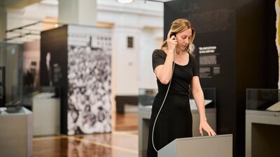 A wide shot of the Dismissal exhibition in King's Hall at Old Parliament House.