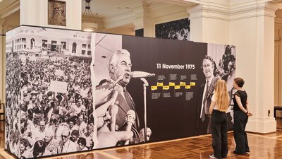 A wide shot of the Dismissal exhibition in King's Hall at Old Parliament House.