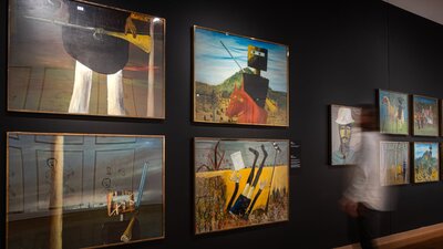 Nolan Collection at Canberra Museum + Gallery Nolan Collection at Canberra Museum + Gallery someone observing the artworks