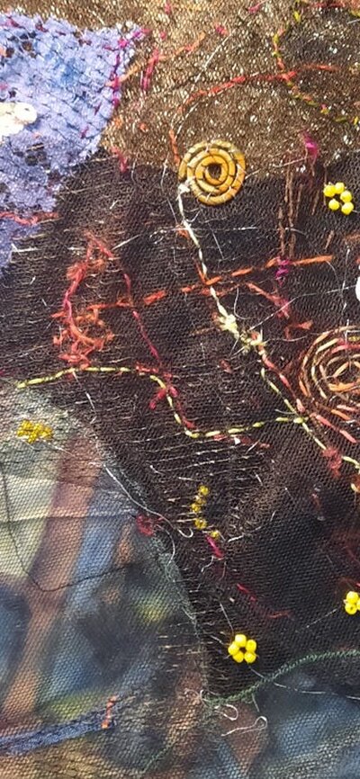 Textile artwork with butterflies and flowers