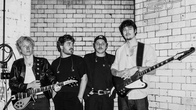 The Rions band members posed with instruments