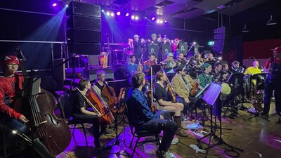 ConneXion Big Band performing, dressed up as video game characters from last performance at the Club