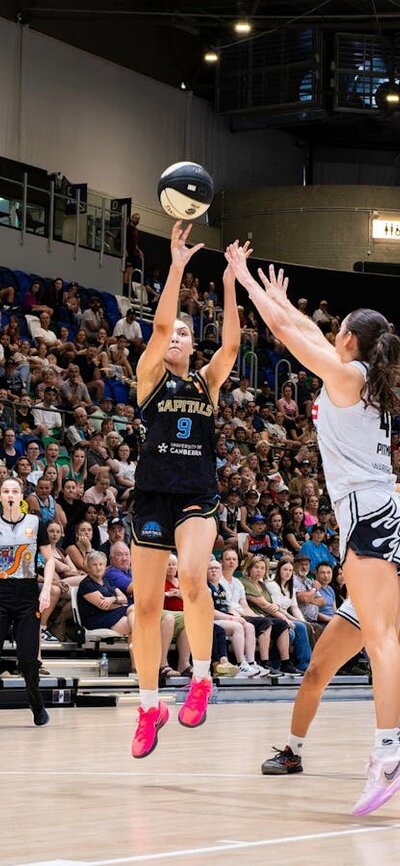 UC Capitals player shooting a jump shot.