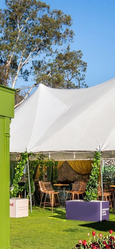 Underground Spirits Gin Garden at Floriade in Canberra, with outdoor bar, seating and spring flowers