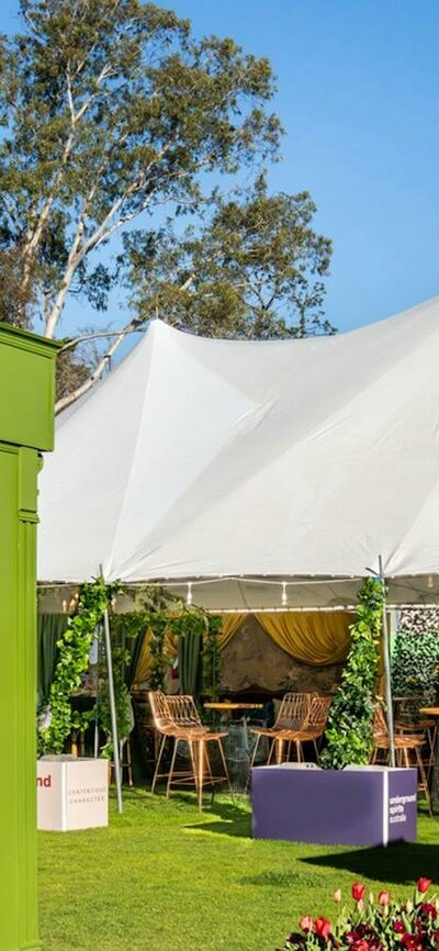 Underground Spirits Gin Garden at Floriade in Canberra, with outdoor bar, seating and spring flowers
