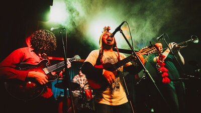 Los Chavos Still of a band performing with singer at front