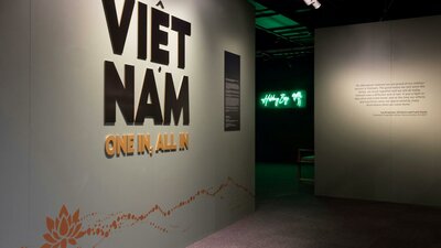 Explore Vietnam - One In, All In Entrance to the galleries with exhibition title on the wall